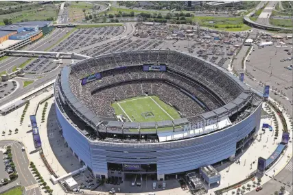  ?? SETH WENIG/AP FILE ?? ABOVE: An aerial view shows MetLife Stadium in East Rutherford. At least a handful of games of the 2026 FIFA World Cup in North America will be played there.