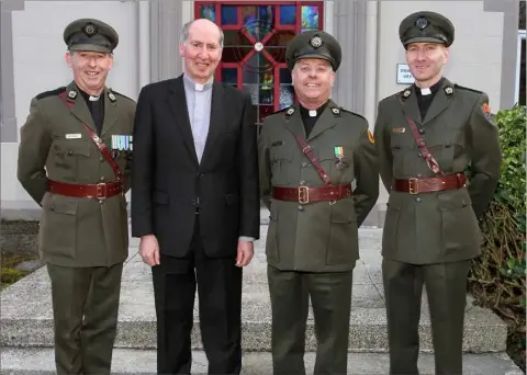  ??  ?? IN THE ARMY NOW: Bishop Denis Brennan with the three army chaplains from the Diocese of Ferns (from left), Fr Pat Mernagh, Fr David Murphy and Fr Brian Whelan.