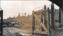  ??  ?? POW camp gates.