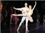  ??  ?? Laura Bosenberg and Daniel Szybkowski as the Sugar Plum Fairy and the Nutcracker Prince.