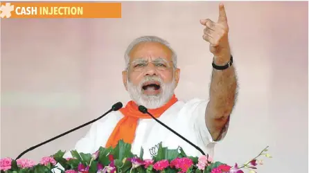  ?? Reuters ?? India’s Prime Minister Narendra Modi addresses his supporters during a public rally at Bhaat village on the outskirts of Ahmedabad. —