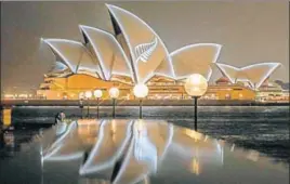  ?? AFP ?? ■ The Sydney Opera House sports the design of New Zealand's silver fern in a show of solidarity.