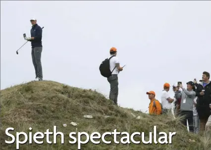  ?? PETER MORRISON, THE ASSOCIATED PRESS ?? Jordan Spieth stands on a mound to look at his ball on the 13th hole, before he began his epic finish to win The Open at Royal Birkdale on Sunday.