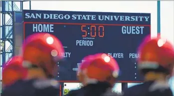  ?? NELVIN C. CEPEDA U-T ?? Members of the San Diego State Aztecs football team started their first practice of the fall camp on Friday.