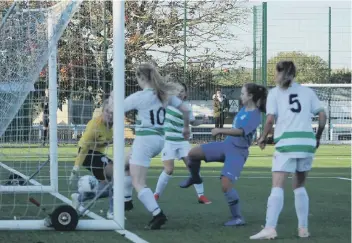  ?? PHOTO: GARY REED ?? The New Saints (hoops) controvers­ial FA Cup equaliser against Posh who didn’t think the ball crossed the line