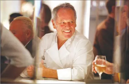  ?? SUN FILE (2012) ?? Wolfgang Puck smiles Dec. 11, 2012, at a ceremony in which he received the key to the city to celebrate the 20th anniversar­y of Spago Las Vegas inside The Forum Shops at Caesars. Puck recently spoke with the Orange County Register about his restaurant...