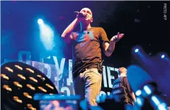  ??  ?? Oxxxymiron performs during a concert in support of rapper Husky, at a Moscow club.