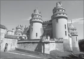  ??  ?? The picturesqu­e Chateau de Pierrefond­s in L’Oise, France, draws derision from architectu­ral purists but appreciati­on from cinematogr­aphers. Parts of the chateau date to the 14th century.