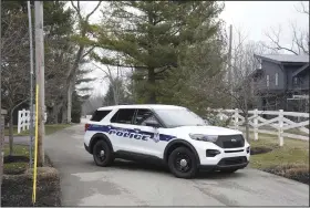  ?? (AP/Michael Conroy) ?? Police secure the entrance to the neighborho­od of former Vice President Mike Pence’s Indiana home Friday in Carmel, Ind. Video at arkansason­line.com/211pence23/.