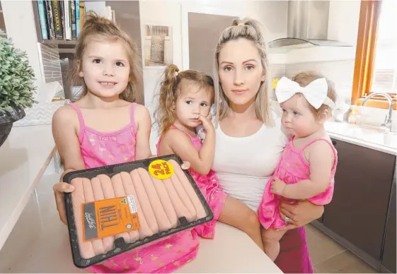  ?? Picture: MIKE BATTERHAM ?? Debee Cullum, mother to daughters Gracie, 4, Amelia, 3, and baby Madeline, is looking to assemble food packs for needy families.