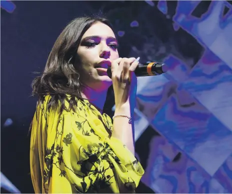  ??  ?? Top, rising British star Dua Lipa will bring her showstoppi­ng performanc­e to Louvre Abu Dhabi; far left, singer Farida Mohammed Ali will present songs from Iraq’s maqam musical tradition; left, the ‘Japanese Connection­s’ exhibition