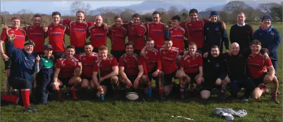  ??  ?? The Charlevill­e team celebrate promotion to Munster J-League Division 2 following their win over Killorglin