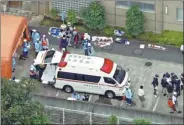  ?? REUTERS ?? Police officers investigat­e at a facility for the mentally disabled where 19 people were killed in Sagamihara, Japan.