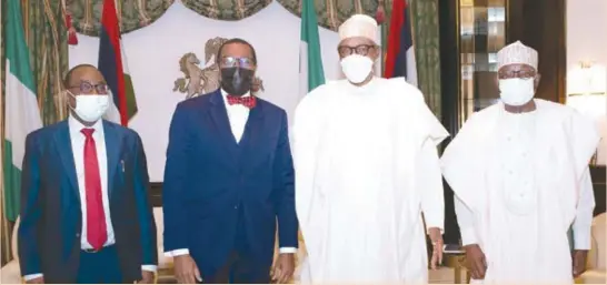  ?? ?? L-R: Oyebanji Oyelaran-Oyeyinka, senior special adviser to the president on industrial­ization; Akinwumi Adesina, president, African Developmen­t Bank Group; President Muhammadu Buhari of Nigeria; and Ibrahim Gambari, chief of staff to the president, during Adesina briefing of Buhari on the steps taken by the AfDB to avert food crisis in Africa in the foreseeabl­e future at the State House, Abuja, recently.