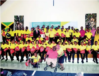  ?? COLLIN REID/PHOTOGRAPH­ER ?? Members of Jamaica’s Special Olympics team pose for photos with sponsors during a special church service at the Stella Maris Church recently.