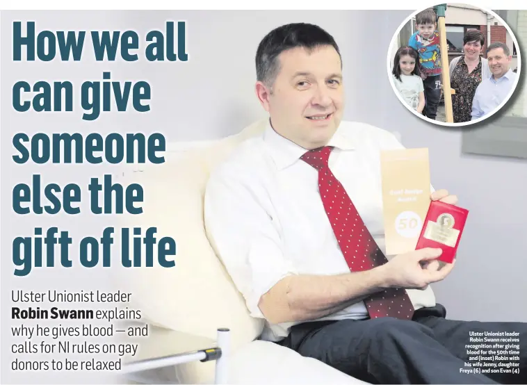  ??  ?? Ulster Unionist leader Robin Swann receives recognitio­n after giving blood for the 50th time and (inset) Robin with his wife Jenny, daughter Freya (6) and son Evan (4)