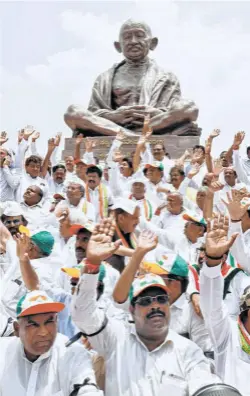  ??  ?? CONGRESS AND JD(S) MLAS protest outside the Vidhana Soudha against the swearing-in of Yeddyurapp­a on May 17.