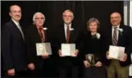  ?? PHOTO COURTESY MOHAWK VALLEY COMMUNITY COLLEGE ?? Mohawk Valley Community College’s Class of 2018Hall of Fame inductees receive plaques at a ceremony held on Oct. 29, at MVCC. From left: MVCC President Randall VanWagoner, Arthur Friedberg, Dr. Robert B. Jubenville, Norayne W. Rosero, and Bill Perrotti.