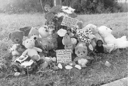  ?? KATHRYN VARN/ASSOCIATED PRESS ?? A memorial for Jordan Belliveau has grown in Largo. The child was living in a home with his father, a known gang member.