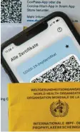  ?? Foto: Puchner, dpa ?? Neue Probleme bei Impfnachwe­isen für Corona‰Apps.