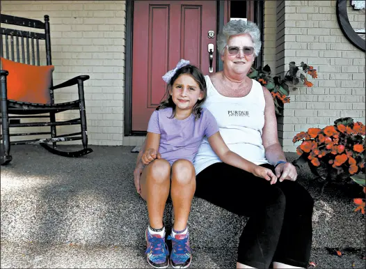  ?? SUZANNE TENNANT/POST-TRIBUNE PHOTOS ?? Bri Hefner Ballor was killed by her husband four years ago, but her mother, Beth Hefner, and her 6-year-old daughter, Brynn, keep her legacy alive through Bri’s RACE to End Domestic Violence.