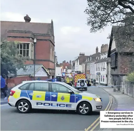  ?? Sam Proudfoot/PA Wire ?? &gt; Emergency services in Salisbury yesterday after two people fell ill in a Prezzo restaurant in the city