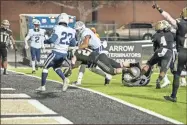  ?? Tim Godbee ?? The Calhoun High School football team, shown here scoring a touchdown against Decatur, is off to Athens Friday night to face Clarke Central in an Elite Eight 5A playoff contests with the winner headed to the state semifnals next week.