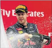  ?? Picture: GETTY IMAGES ?? RED HOT: Sebastian Vettel celebrates in Yeongam-gun, South Korea, after winning the Korean Grand Prix for the third successive time yesterday