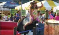  ?? FRAN MAYE — DIGITAL FIRST MEDIA ?? Kids and adults will love the mechanical bull riding at this year’s Unionville Community Fair.