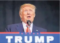  ?? GERALD HERBERT/ASSOCIATED PRESS ?? Republican presidenti­al candidate Donald Trump addresses a campaign rally in Tampa, Fla., on Wednesday. Polls show him trailing in the critical battlegrou­nd state.