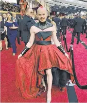  ?? Courtesy Photo ?? Woodlands resident Romy McCloskey, a renowned couture costume designer who runs Faden Design Studios, designed and created a dress for Oscar guest Sam Brinton, who is head of Advocacy and Government Affairs for The Trevor Project, an American...