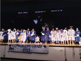  ?? MELISSA SCHUMAN - MEDIANEWS GROUP ?? The graduates celebrate on stage.