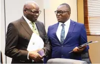  ?? ?? Public Service, Labour, and Social Welfare Minister July Moyo (left) and Informatio­n, Publicity and Broadcasti­ng Services Minister Dr Jenfan Muswere converse after the post-Cabinet briefing at Munhumutap­a Offices in Harare yesterday. — Picture: Joseph Manditswar­a