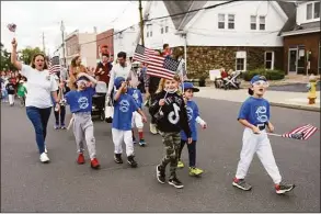  ?? Tyler Sizemore / Hearst Connecticu­t Media ?? Photos from the Memorial Day Parade in Old Greenwich, May 31, 2021. Presented by the Sound Beach Volunteer Fire Department, the event honored those who gave their lives in service to the country and featured a memorial ceremony after the parade. The parade will return this Memorial Day at 10 a.m.