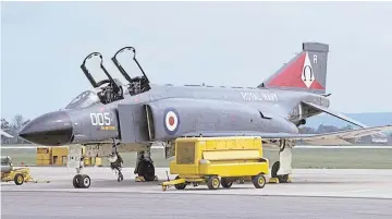  ?? ?? An F-4K FG1 Phantom of 892 Naval Air Squadron in the 1970s. Do you have any photos of an aircraft of the same type – dubbed Black Mike – that was based at RAF Leuchars?