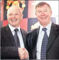  ??  ?? BID: Kenyon with Sir Alex Ferguson at Old Trafford