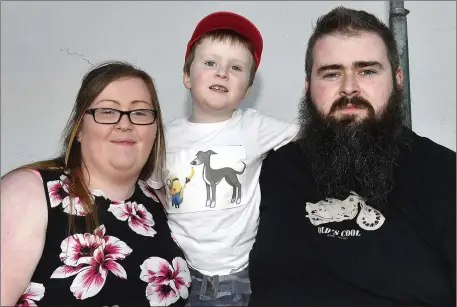  ??  ?? Catherine and Aiden Murphy with their son Joe, from Abbeyfeale, enjoying the their night out at the dogs at the Kingdom Greyhound Stadium on Friday night. Photo by www.deniswalsh­photograph­y.com