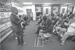  ?? CAIRNS/COLUMBUS DISPATCH ADAM ?? Pastor David Forbes from the Columbus Christian Center Church leads a prayer during a Black Voices for Trump rally in Westervill­e on Wednesday.