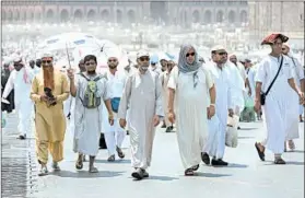  ?? AHMAD AL-RUBAYE/GETTY-AFP ?? Ready for hajj: Pilgrims are in Mecca, Saudi Arabia, on Saturday ahead of the six-day hajj, which begins Sunday in the holy city. More than 2 million worshipper­s are expected to take part in what is considered one of the five pillars of Islam.