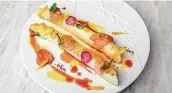  ?? Alain Verzeroli ?? The opening menu features French white asparagus, orange reduction, puffed buckwheat and strawberri­es.