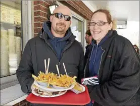  ?? FILE PHOTO ?? Dennis Recore Jr. and Julie Crossman of North Greenbush brave cold temperatur­es to enjoy a meal outside at Jack’s Drive In.