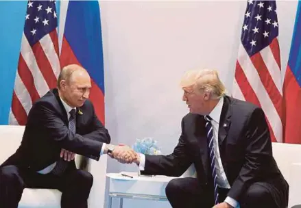  ?? FILE PIC ?? Ten years ago, when Russian money was pouring into the West, Trump began praising the country and its leader: ‘Look at Putin ... he’s doing a great job in rebuilding the image of Russia and also rebuilding Russia, period.’