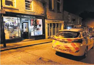  ??  ?? Police on Warner Street in Accrington responding to shop burglaries