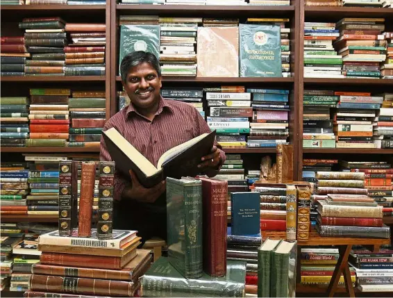  ??  ?? S. Jai Shankar with his huge collection of priceless old books. — FAIHAN GHANI/The Star