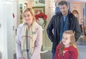  ?? PHOTOS COURTESY OF THE HALLMARK CHANNEL ?? Kellie Pickler’s scarf? Claire Elizabeth Green’s sweater? Wes Brown’s stubble? Who knows what items may be on sale during the upcoming “Set Decoration, Props and Wardrobe Sale” from the Hallmark Channel’s “Graceland” films.