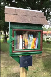  ?? MACOMB DAILY FILE PHOTO ?? Pictured is a Little Free Library built in New Baltimore’s community park at Main and Green streets. Dakota High School’s National English Honor Society students are working to erect a Little Free Library at Macomb Corners Park in Macomb Township.