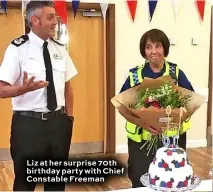  ??  ?? Liz at her surprise 70th birthday party with Chief Constable Freeman