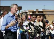  ?? ANDRES LEIGHTON—THE ASSOCIATED PRESS ?? In this June 21, 2018, file photo, New York Mayor Bill de Blasio speaks alongside a group of other U.S. mayors during a news conference outside a holding facility for immigrant children in Tornillo, Texas, near the Mexico border.