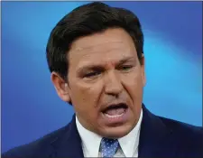  ?? AP FILE ?? SUCCESSFUL STUNT: Florida Gov. Ron DeSantis seemed to score political points by sending two planeloads of immigrants from Venezuela to Martha’s Vineyard, saying it’s easy for northerner­s to talk about being kind to all, but not so easy when immigrants show up at your door.
