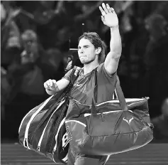  ?? - AFP photo ?? Spain’s Rafael Nadal waves to the crowd after losing his singles match against Belgium’s David Goffin on day two of the ATP World Tour Finals tennis tournament at the O2 Arena in London on November 13, 2017.